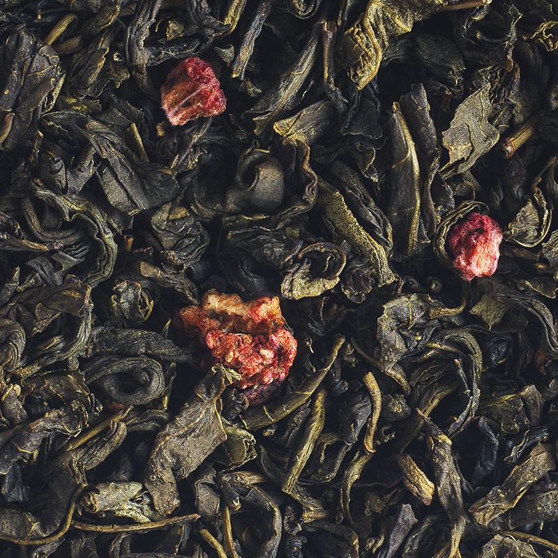 Organic green tea with red berries in bulk.
